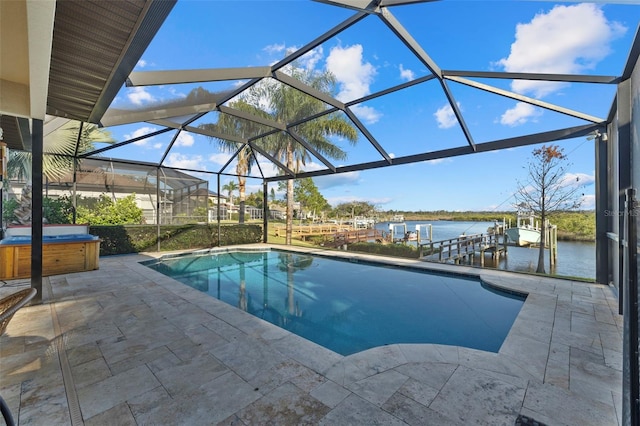 1881 Riveredge Dr, Tarpon Springs, FL 34689 - swimming pool with a hot tub, a patio, a water view, and glass enclosure