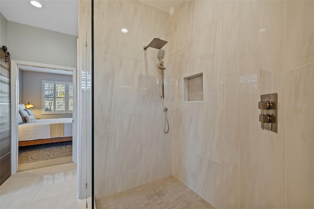 1881 Riveredge Dr, Tarpon Springs, FL 34689 - ensuite bathroom featuring tiled shower and tile patterned floors