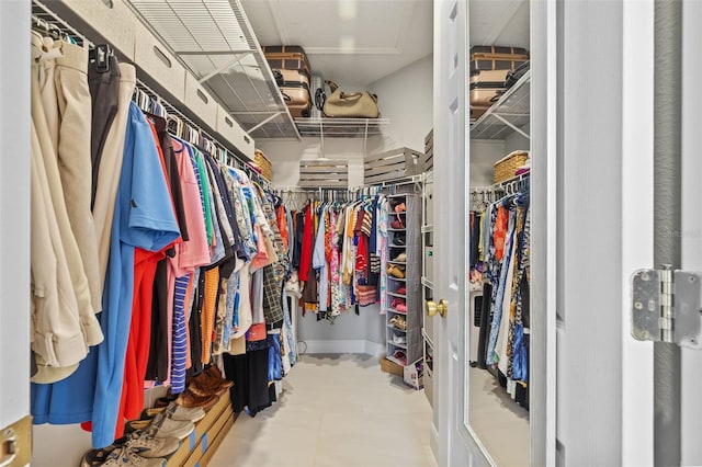 1881 Riveredge Dr, Tarpon Springs, FL 34689 - walk in closet featuring tile patterned floors