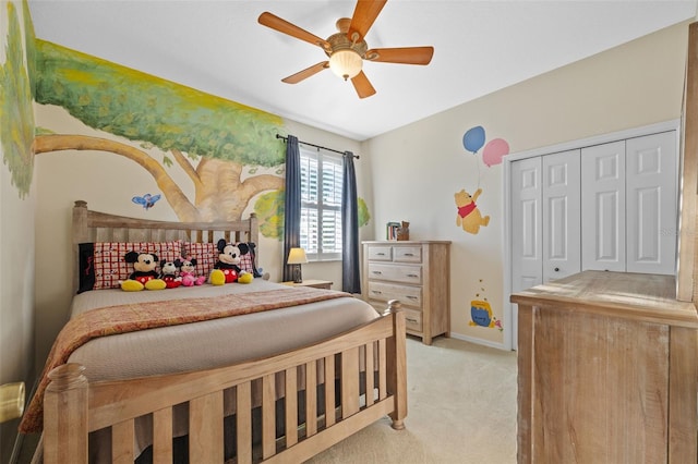 1881 Riveredge Dr, Tarpon Springs, FL 34689 - bedroom featuring light carpet, ceiling fan, a closet, and baseboards