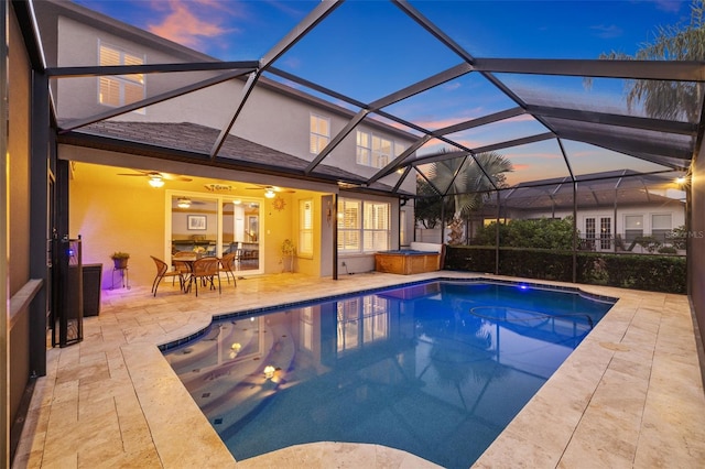 1881 Riveredge Dr, Tarpon Springs, FL 34689 - swimming pool with a patio area, a ceiling fan, and glass enclosure