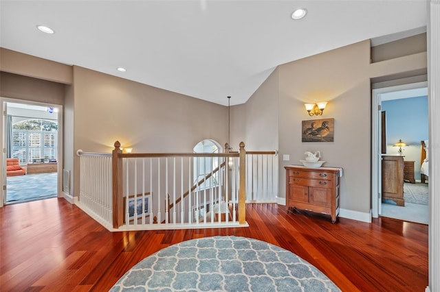 1881 Riveredge Dr, Tarpon Springs, FL 34689 - hallway with wood finished floors, an upstairs landing, baseboards, and recessed lighting