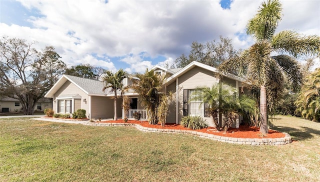 ranch-style home with a porch and a front yard