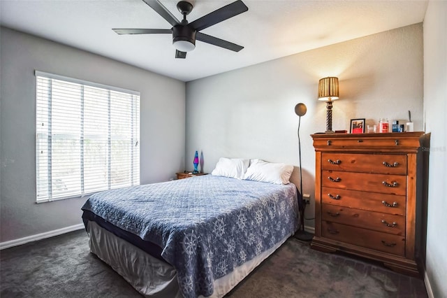 carpeted bedroom with ceiling fan