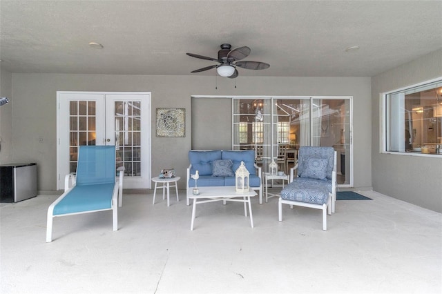 view of patio with french doors, ceiling fan, and an outdoor hangout area