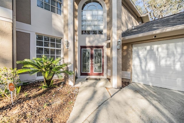 doorway to property featuring a garage