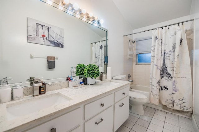 full bathroom featuring vanity, toilet, tile patterned flooring, and shower / bath combo