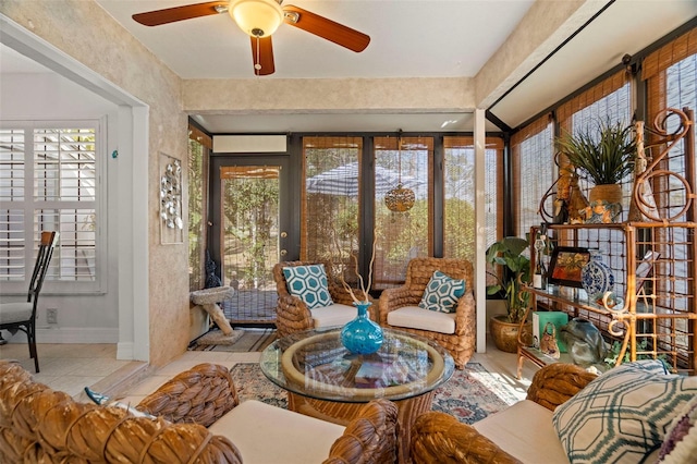 sunroom featuring plenty of natural light and ceiling fan