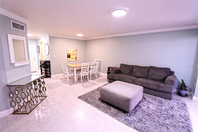 living room with crown molding and light tile patterned floors