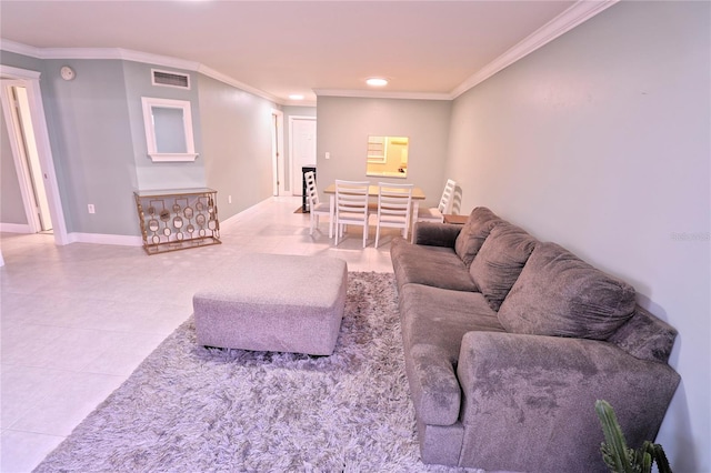 living room with light tile patterned floors and ornamental molding