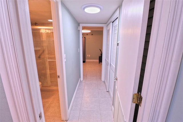 corridor with light tile patterned floors