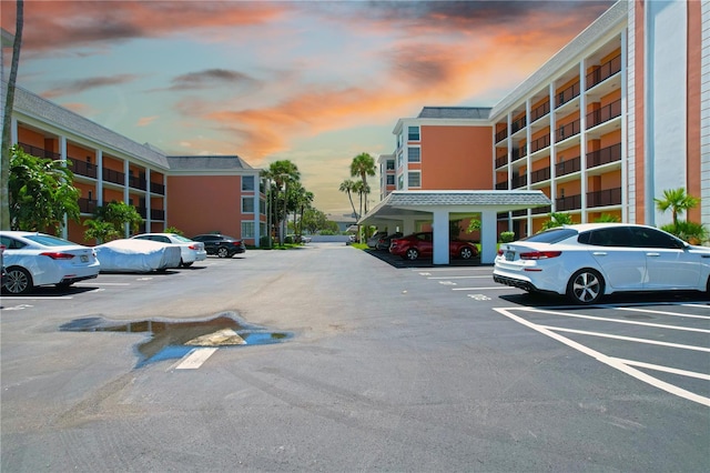 view of parking at dusk