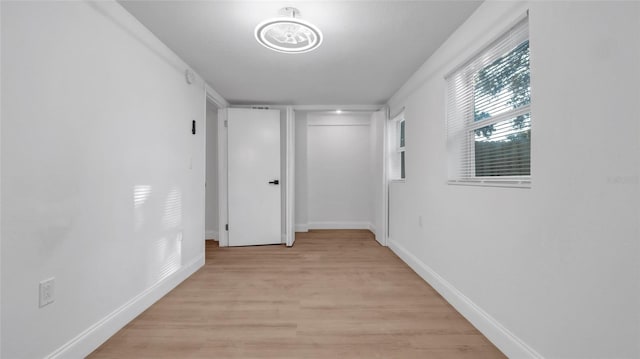 hallway featuring light wood-type flooring