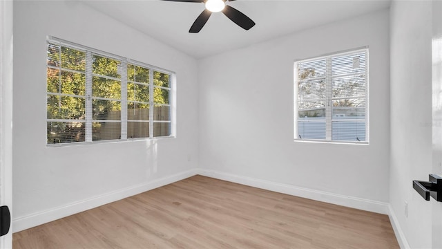 unfurnished room featuring ceiling fan, a healthy amount of sunlight, and light wood-type flooring