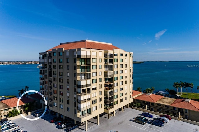 view of building exterior with a water view