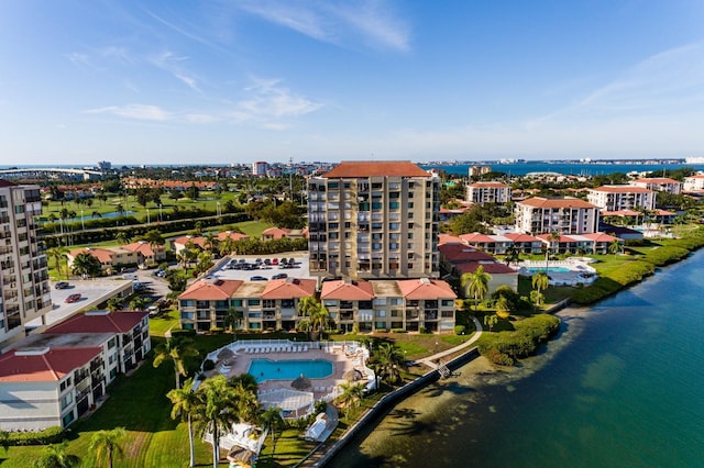 birds eye view of property with a water view