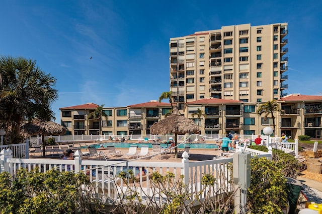 view of property featuring a community pool