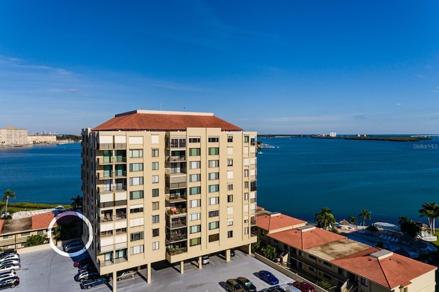 view of building exterior with a water view