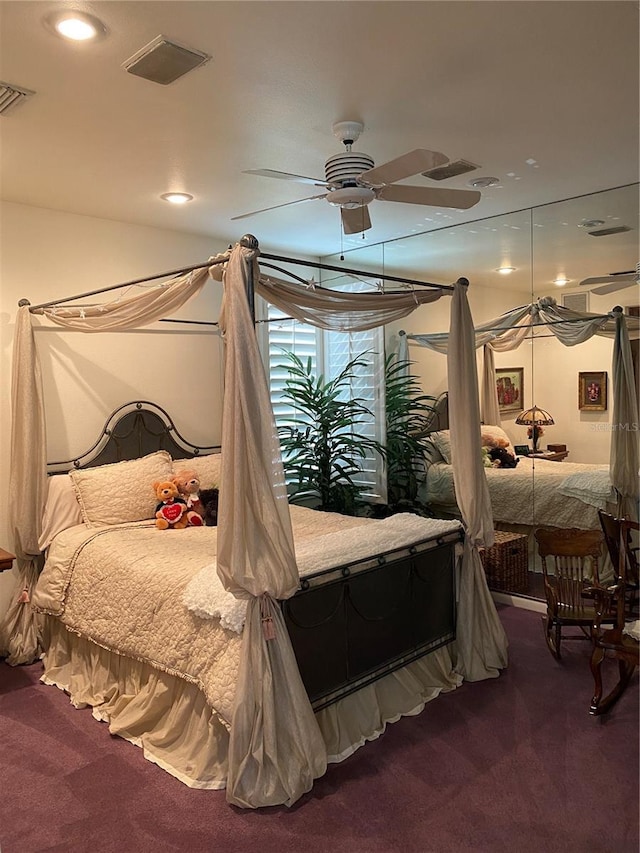 bedroom with ceiling fan and carpet flooring