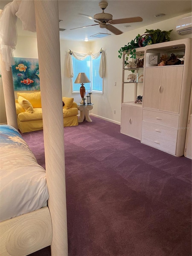 carpeted bedroom with ceiling fan and a wall mounted air conditioner