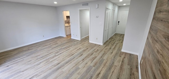 empty room featuring light hardwood / wood-style floors