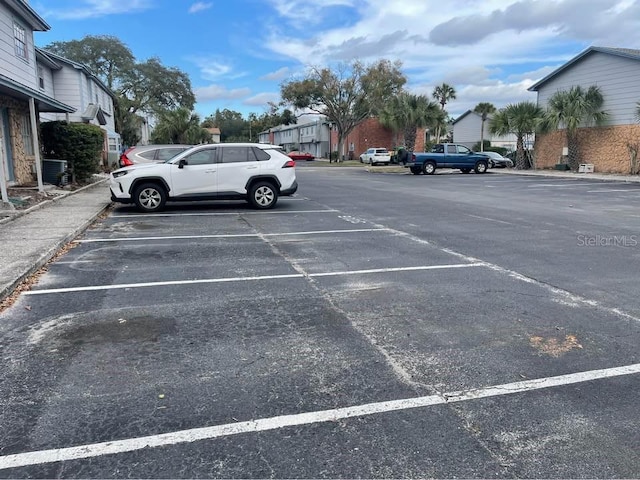 view of parking / parking lot