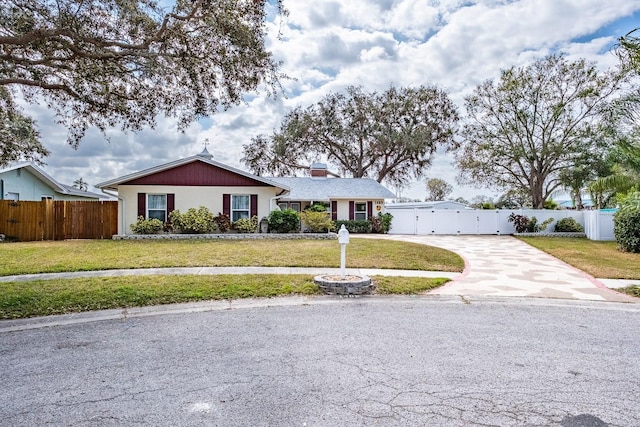 ranch-style house with a front yard