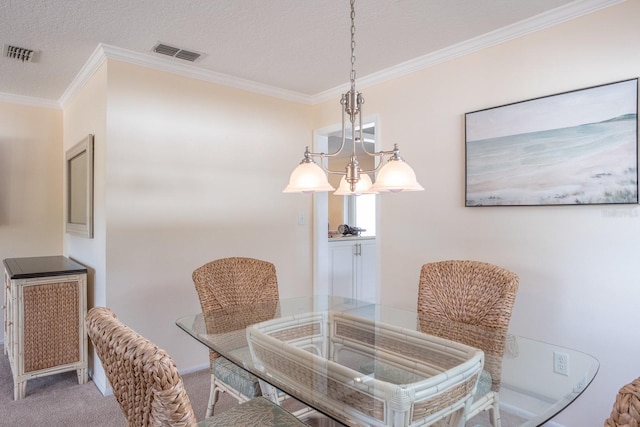 dining area featuring light colored carpet, ornamental molding, and a textured ceiling