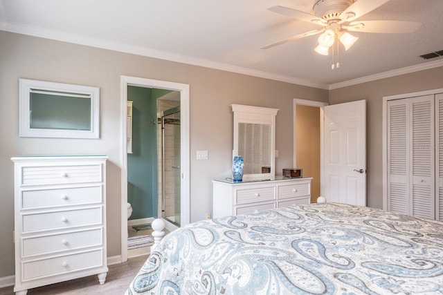 bedroom featuring crown molding, ensuite bath, light hardwood / wood-style flooring, a closet, and ceiling fan