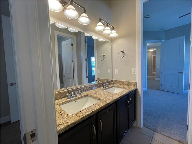 bathroom featuring vanity and tile patterned flooring