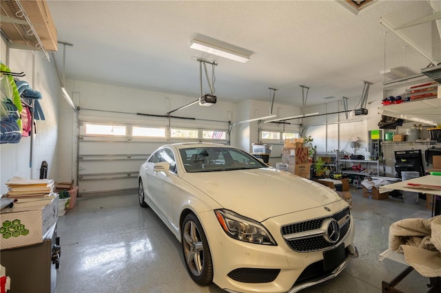 garage featuring a garage door opener