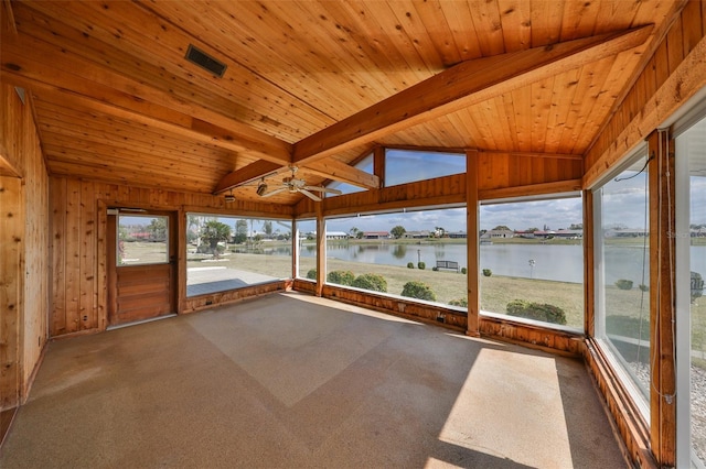 unfurnished sunroom with a water view, ceiling fan, wooden ceiling, and vaulted ceiling with beams