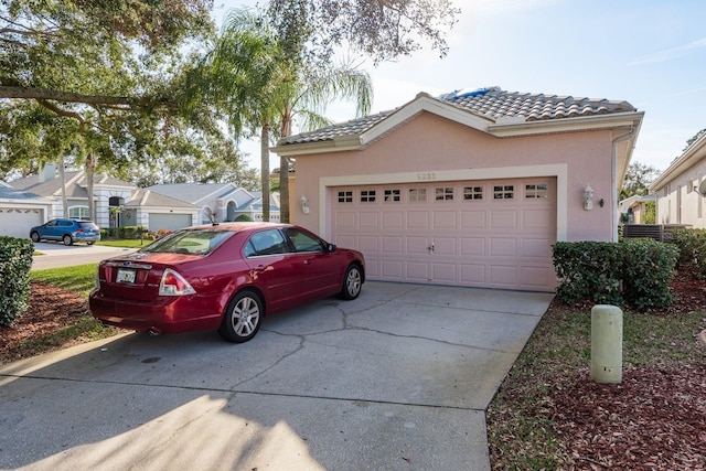 exterior space with a garage