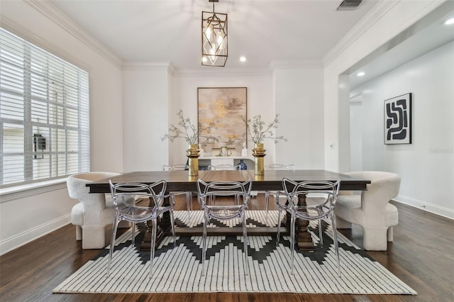 dining space featuring ornamental molding, a notable chandelier, and dark hardwood / wood-style flooring