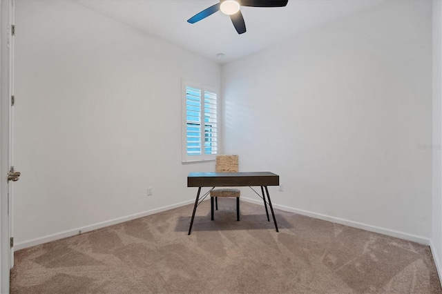 unfurnished office with light carpet and ceiling fan