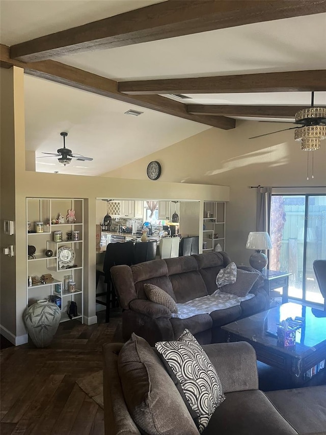 living room featuring hardwood / wood-style flooring, lofted ceiling with beams, and ceiling fan