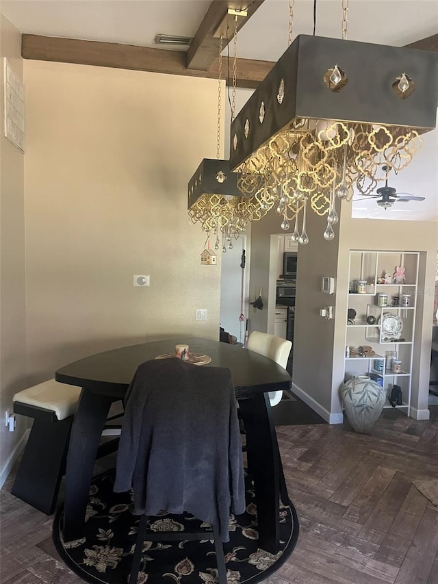 dining room featuring a high ceiling, dark hardwood / wood-style floors, and beam ceiling