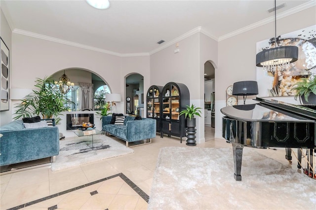 interior space featuring light tile patterned flooring, ornamental molding, and a notable chandelier