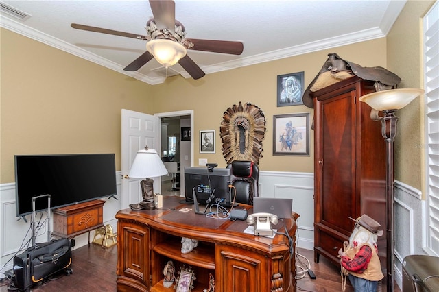 office area with ornamental molding, dark hardwood / wood-style floors, and ceiling fan