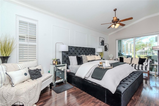 bedroom featuring lofted ceiling, crown molding, dark wood-type flooring, and ceiling fan