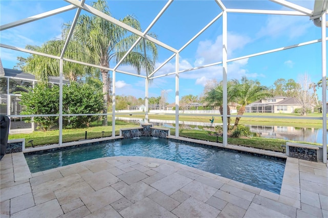 view of pool with pool water feature, a water view, glass enclosure, and a patio area