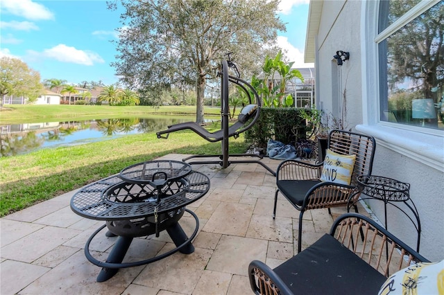 view of patio featuring a water view