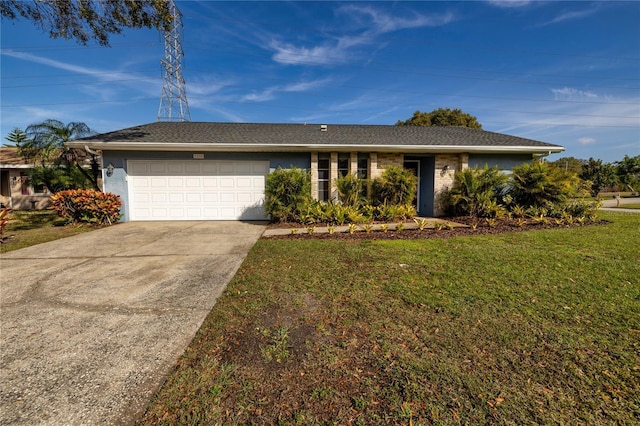 ranch-style home with a garage and a front lawn