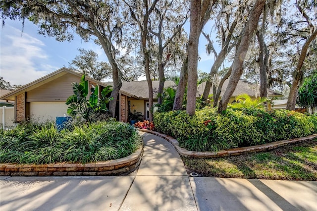 single story home featuring a garage