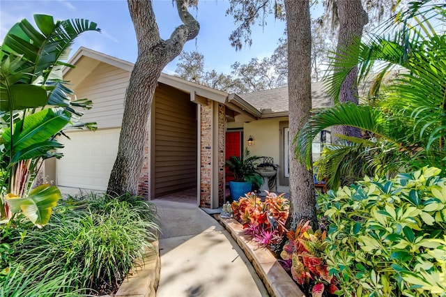 property entrance with a garage