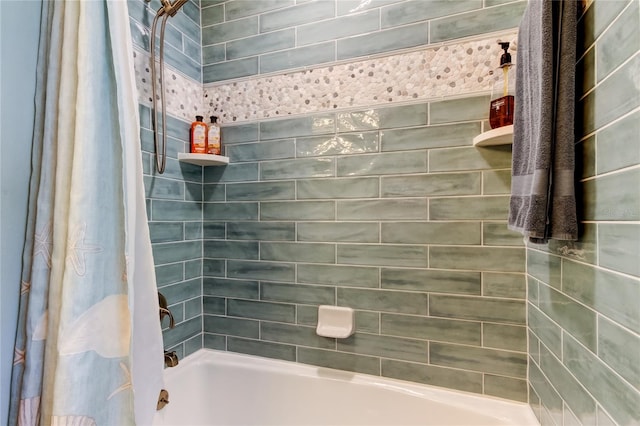 bathroom with shower / tub combo