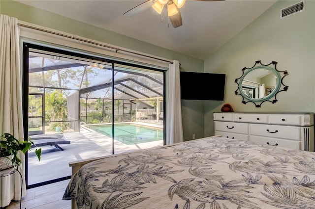 bedroom with lofted ceiling, access to exterior, and ceiling fan