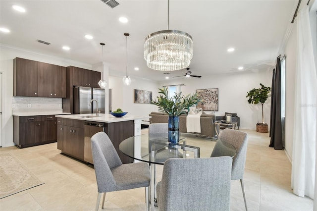 dining room with ornamental molding, recessed lighting, visible vents, and light tile patterned floors