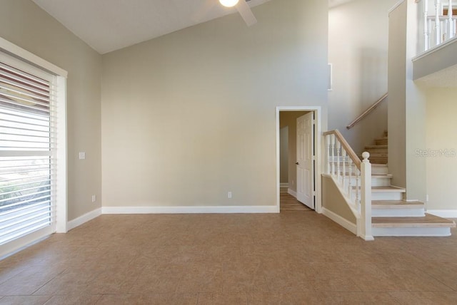 interior space featuring a towering ceiling