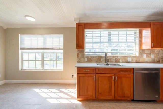 kitchen with stainless steel dishwasher, ornamental molding, sink, and backsplash